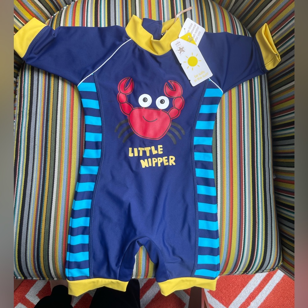 Brand-new Adams Baby UK swimsuit, 50+ SPF, 9-12months
